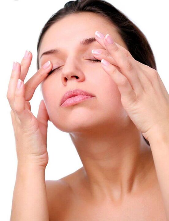massage on the skin around the eyes for rejuvenation